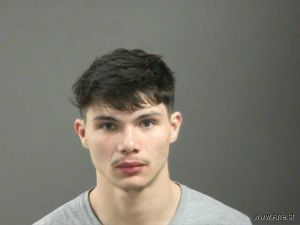 Eli Flores Arrest Mugshot