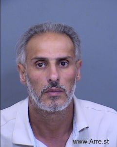 Raid Awad Arrest Mugshot