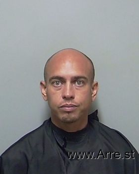 Angel  Roman Mugshot