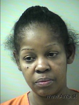 Erika Charmaine James Mugshot