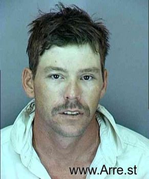 John Wayne Caster Mugshot