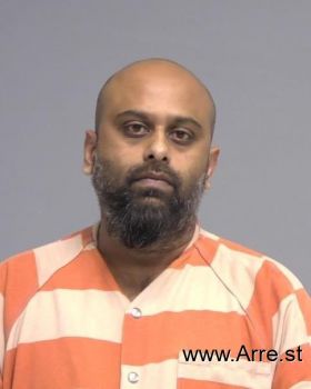 Navindra Rickey Dhanessar Mugshot