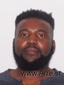 Elie Augustin Arrest Mugshot