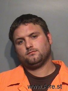 Travis Wells Arrest