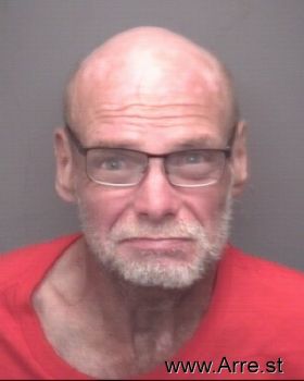 Wayne Givens Below Mugshot