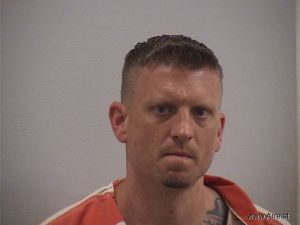 Justin Hughes Arrest Mugshot