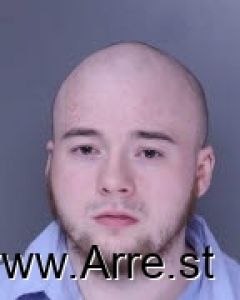 Archer Kibe Arrest Mugshot