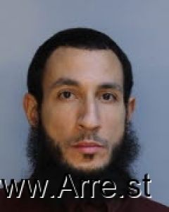 Julian Justiniano Arrest Mugshot