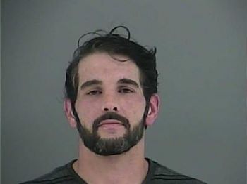 Eric Mack Hansard Mugshot