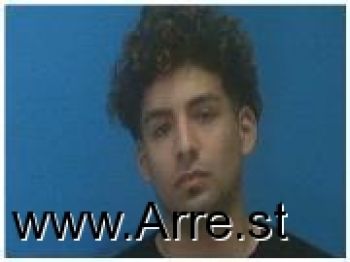 Miguel Angelo Flores Mugshot