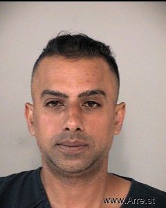 Azim Chranya Arrest Mugshot