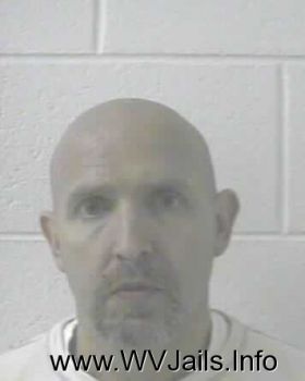 Bruce Kelly Young Mugshot