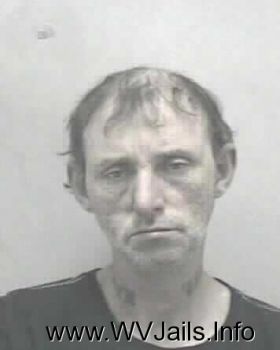 Charles Nmi Wolford Mugshot