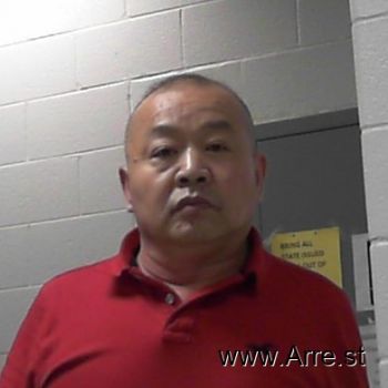 Quide  Wang Mugshot