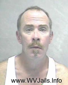 Bruce Evans Arrest Mugshot