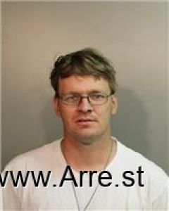 George Moore Arrest Mugshot