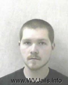 Zachary Arms Arrest Mugshot