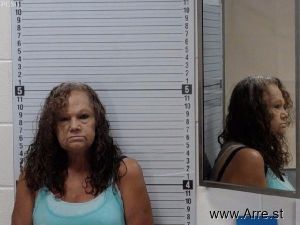 Kay Flores Arrest Mugshot