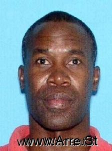 Jean Neptune Arrest Mugshot