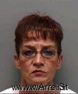 Nola Agusi Arrest Mugshot