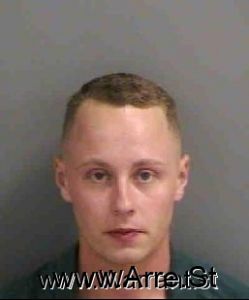 Travis Bomstad Arrest Mugshot