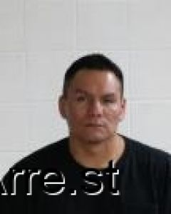 Louis Tiokasin Arrest Mugshot